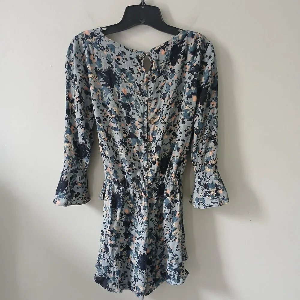 Free People Size S All the Right Ruffles Blue Floral Romper Flutter Sleeve Vneck
